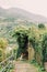 Descending path in a picturesque green garden, nature of Monterosso, Italy