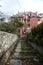 Descending staircase bordered by stone wall