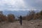 Descending from the summit and saluting position of a cycling lady