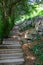 Descent from the Bastille fortress by stairs, staircase of giants in central part of Grenoble city witn mountains around, old