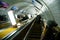 Descent on the escalator to the Moscow metro station