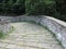 Descent stone walkway of medieval bridge known as Ponte del Diavolo in Borgo a Mozzano, Italy