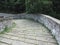 Descent stone walkway of medieval bridge known as Ponte del Diavolo in Borgo a Mozzano, Italy