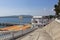 Descent to the beach Caucasus and cafe Harbour on the promenade of the resort of Gelendzhik