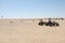 Desert buggy cars stand still in bright sunshine