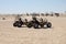 Desert buggy cars stand still in bright sunshine