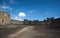 Desert castle Qasr al Azraq in eastern Jordan under clear blue s