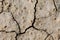 Desert dried and cracked ground. erosion earth background. cracked dry wall surface. white natural cracked texture. desert