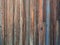 Desert garden wooden fence old rusted nails knot holes wood plank wall