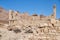 Desert ghost town in Nevada with rubble of stone buildings