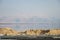 Desert hills and reflective Salty dead Sea and many others, Masada Israel