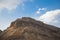 Desert hills and reflective Salty dead Sea, Masada Israel.