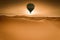 Desert and hot air balloon Landscape at Sunrise