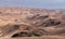 Desert landscape with bedouin settlement in the Judaean Desert, Israel.