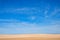 Desert landscape and blue sky with some cirrus clouds