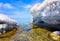 Desert landscape of Dead Sea coastline with white salt, Jordan, Israel.