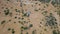 Desert landscape. Dirt road that crosses a desert. Aerial view