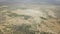 Desert landscape. Dirt road that crosses a desert. Aerial view