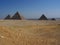 Desert Landscape Giza Pyramids with Cairo City in Distanc