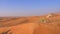 Desert landscape high hills on sandy dunes. Yellow sand dunes in hot wild desert