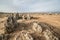 Desert landscape with rock formations of sharp rocks and dry land