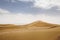 Desert Landscape of zagora in Marocco, with a blue sky, stones,