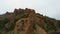 Desert mountain volcanic landscape on Teide National Park with coniferous forest on cloudy day. Hiking area. Highest