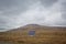 Desert-mountainous terrain . Blue sky with many white clouds. Desert and Mountain Landscape with Azerbaijan . Desert and blue sky