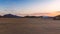 Desert nomad huts at sunset
