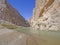 Desert River Entering a Remote Canyon