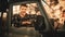 Desert Road Trip: Portrait of Handsome Male Explorer Looking out of Car Driver Window and Smiling