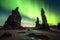 desert rock formations backlit by mesmerizing northern lights