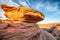 Desert with rocks and blue sky at sunset