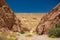 Desert rocky narrow path way picturesque bright sunny nature scenery landscape of Red Canyon famous heritage natural destination