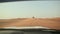 Desert Safari SUVs bashing through the arabian sand dunes. View from the car 10.
