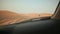 Desert Safari SUVs bashing through the arabian sand dunes. View from the car 2.