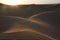 Desert sand dunes with sunset