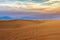 Desert with sand dunes at sunset, wilderness desert landscape or panorama