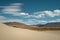 Desert and strangely shaped clouds