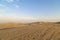 Desert during sunset at Huacachina Oasis in Ica, Peru