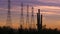 Desert sunset power electricity pylons Arizona evening