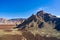 Desert terrain and lava fields near the volcano crater