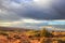 The desert under stormy skies in Arches National Park.