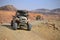 Desert vehicle at bottom of Makhtesh Ramon Crater, Mitzpe Ramon, Negev desert, Israel