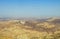 desert view with rock and no person seen from the top