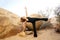 Desert Yoga Woman Half Moon Balance 
