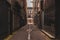 Deserted alleyway next to the busy street of St. Patrick in the heart of the city of Cork in Ireland