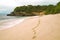 Deserted Bali Beach with Footprints.