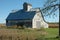 Deserted barn with apple tree