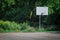 Deserted basketball court in a sunny park